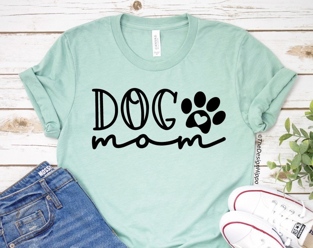 dog mom SVG design on a light green t-shirt made with cricut maker